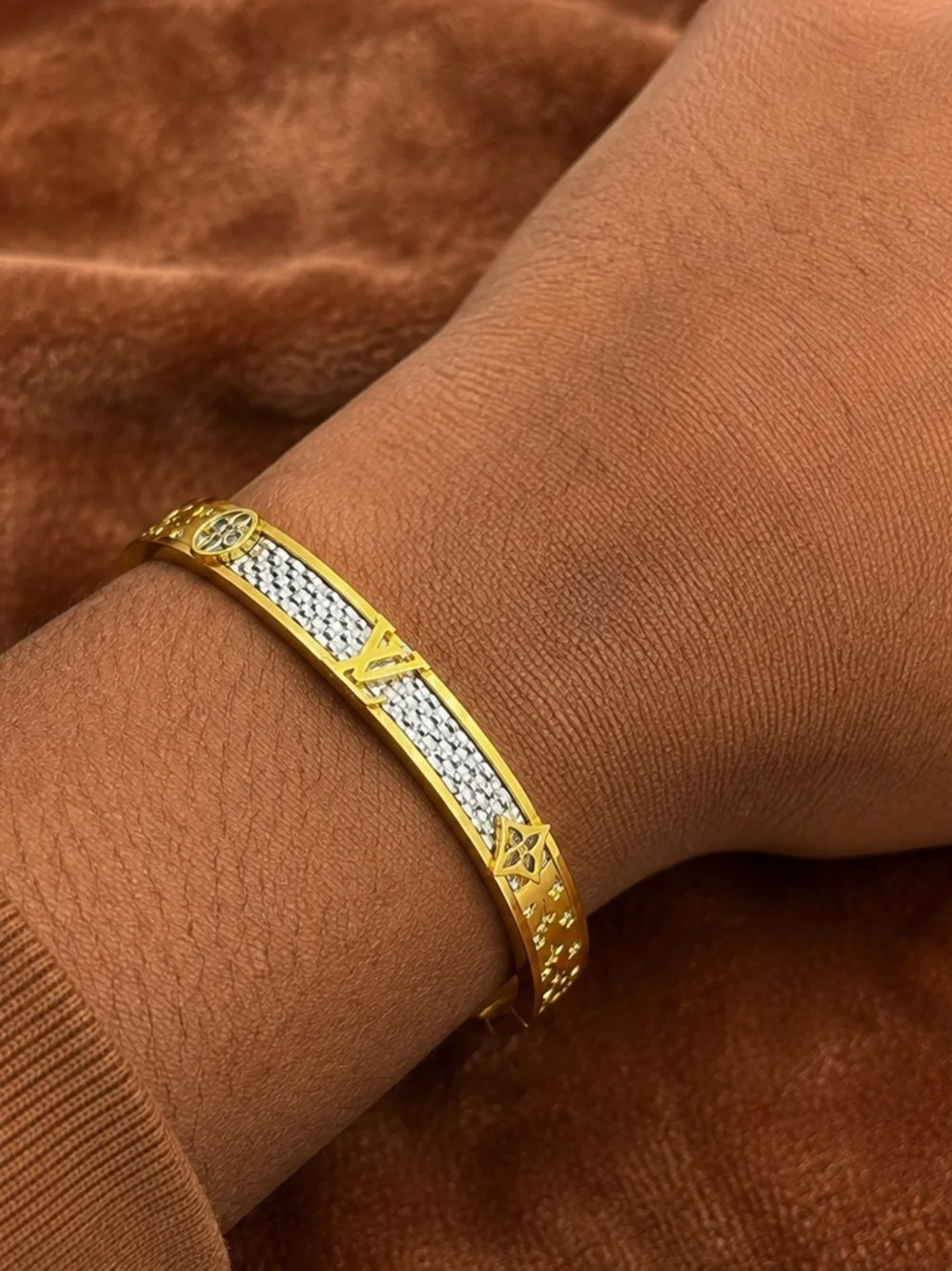 Louis Vuitton Gold Bracelet with Blue Ribbon Accent